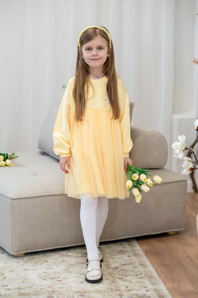 Binira sárga részletekkel ellátott ruha